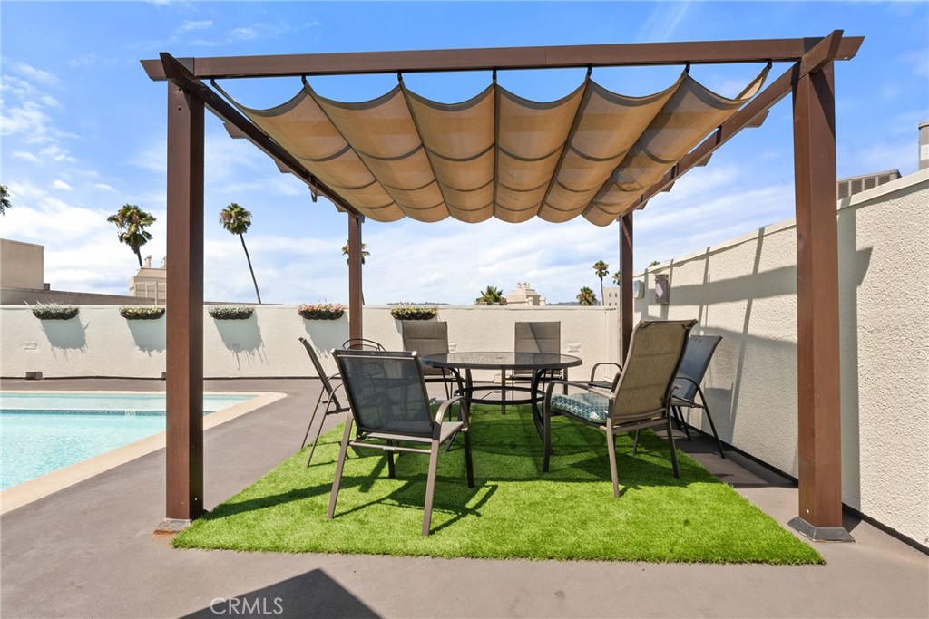 620 South Gramercy Place, Unit 412 Los Angeles, CA 90010 - Photo 27 of 41 a view of an outdoor sitting area with furniture