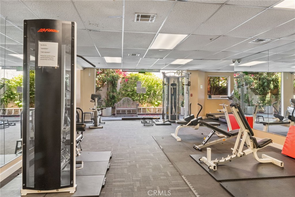 620 South Gramercy Place, Unit 412 Los Angeles, CA 90010 - Photo 31 of 41 a view of a room with gym equipment