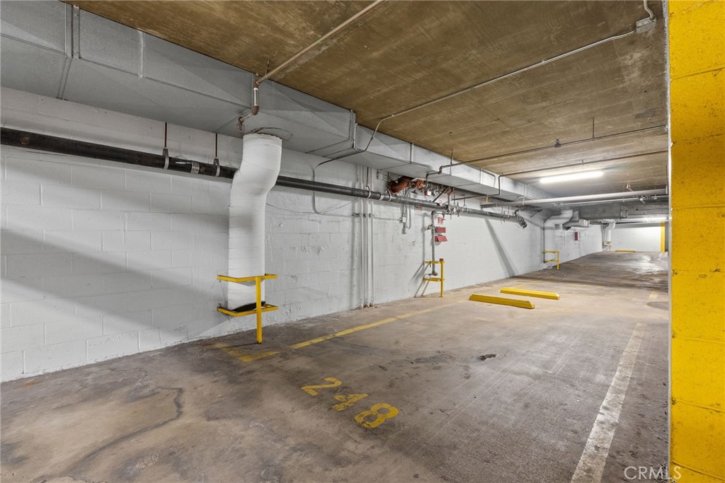 620 South Gramercy Place, Unit 412 Los Angeles, CA 90010 - Photo 36 of 41 a view of a indoor garage