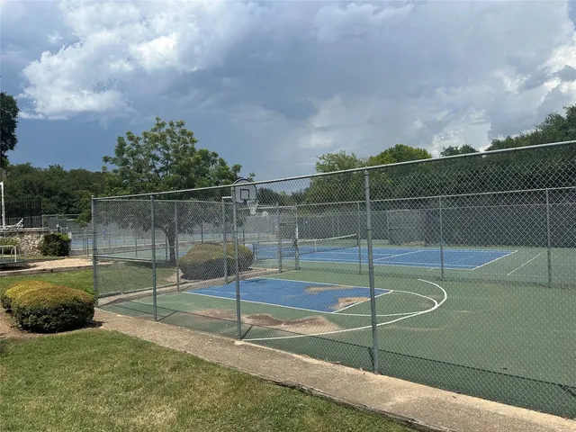 a swimming pool with outdoor seating and yard