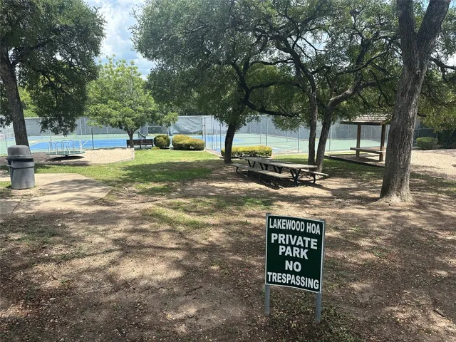 a view of an ocean and a yard