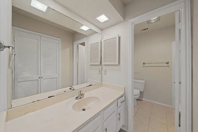 a bathroom with a sink and a toilet