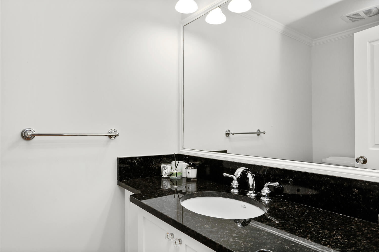 12 Ridgewood Road Rowayton, CT 06853 - Photo 18 of 35 a bathroom with a sink and a mirror