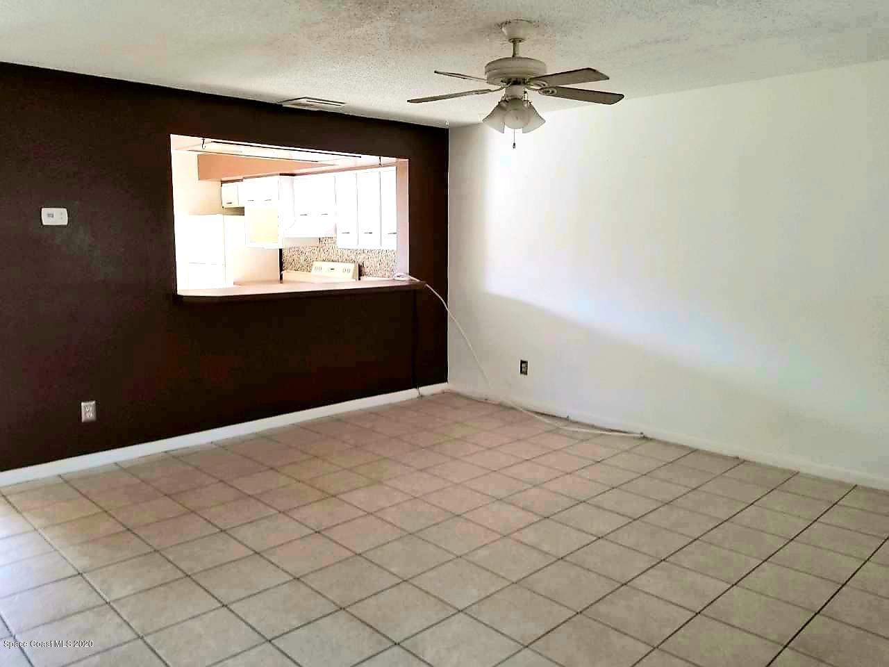 1882 Murrell Road, Unit I33 Rockledge, FL 32955 - Photo 4 of 19 20200125_115038
