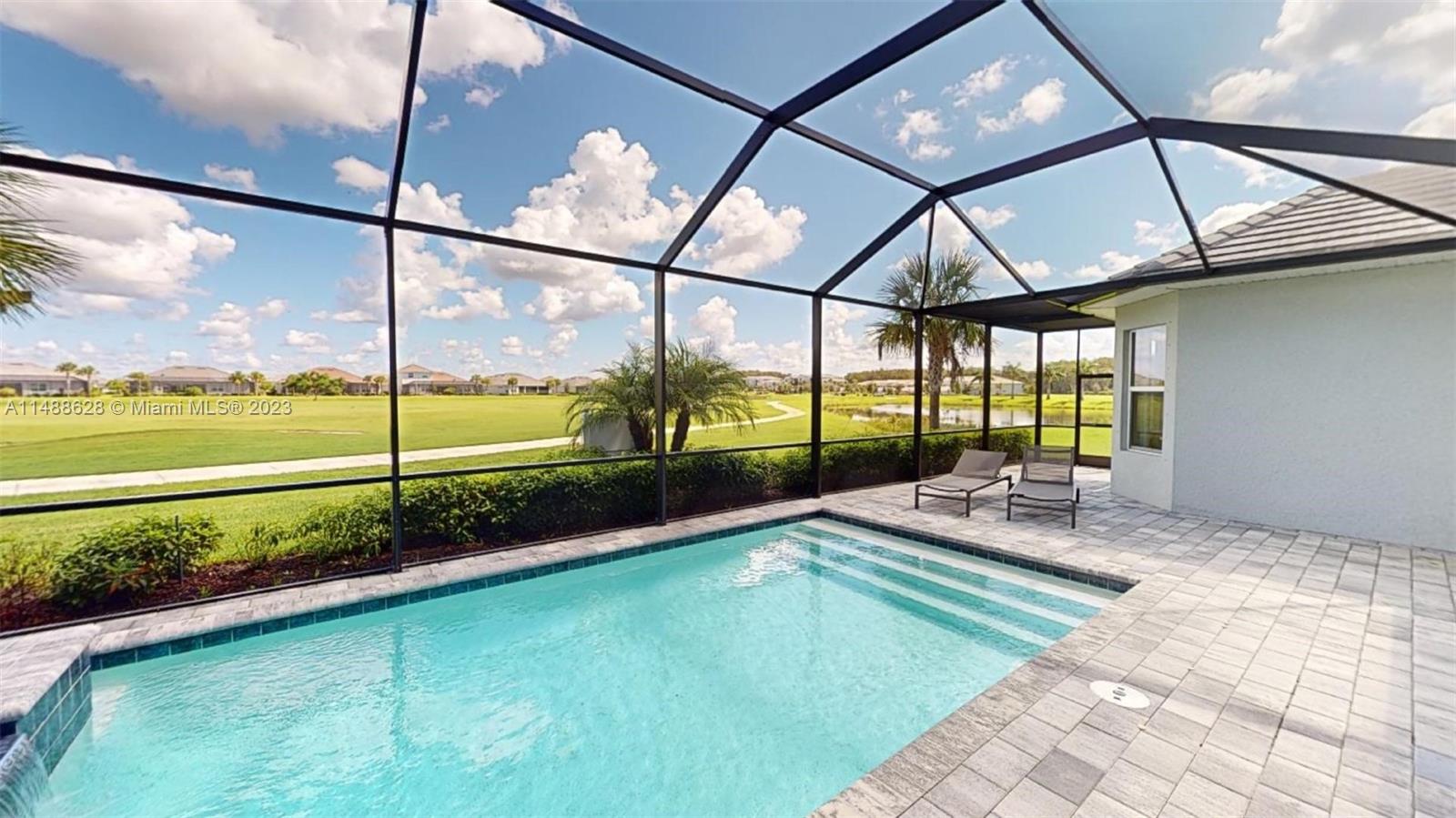 Ave Maria Immokalee, FL 34142 - Photo 59 of 64 a view of swimming pool with a yard