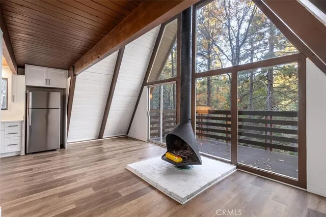 a bedroom with a bed and with a window