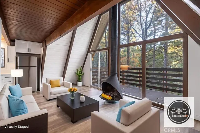 a view of outdoor space with deck and wooden fence