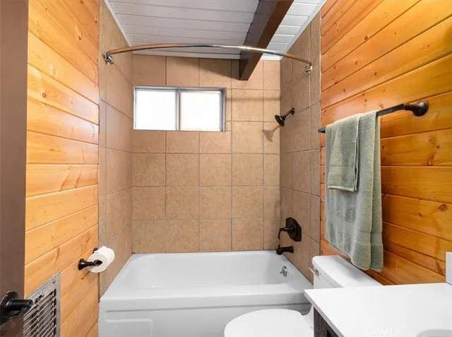 a view of a yard with large trees