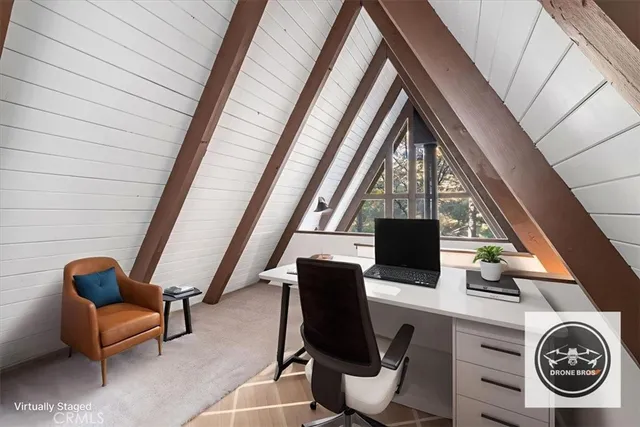 a view of a backyard with large trees