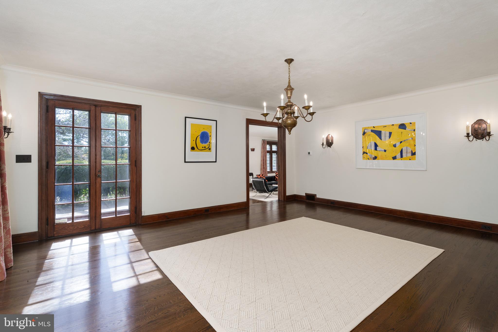 94 N Road Princeton, NJ 08540 - Photo 15 of 57 a bedroom with a bed and a chandelier