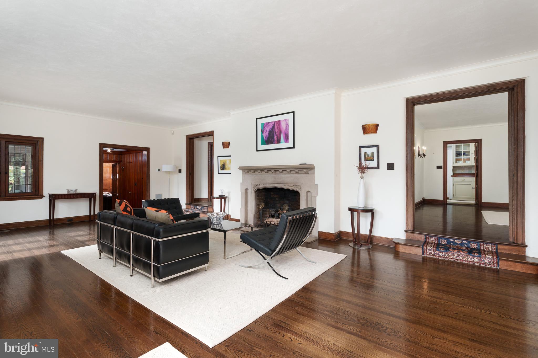 94 N Road Princeton, NJ 08540 - Photo 19 of 57 a living room with furniture fireplace and wooden floor
