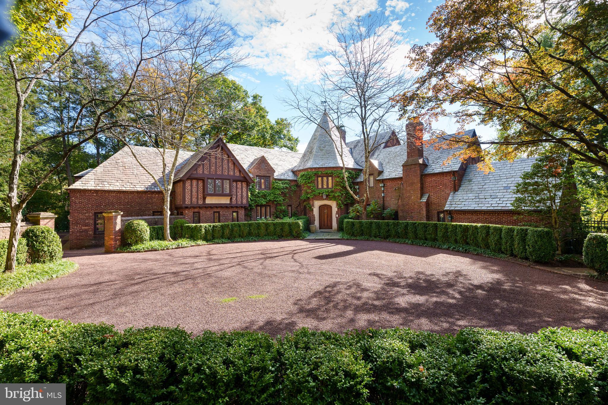 94 N Road Princeton, NJ 08540 - Photo 2 of 57 a front view of a house with a garden and trees