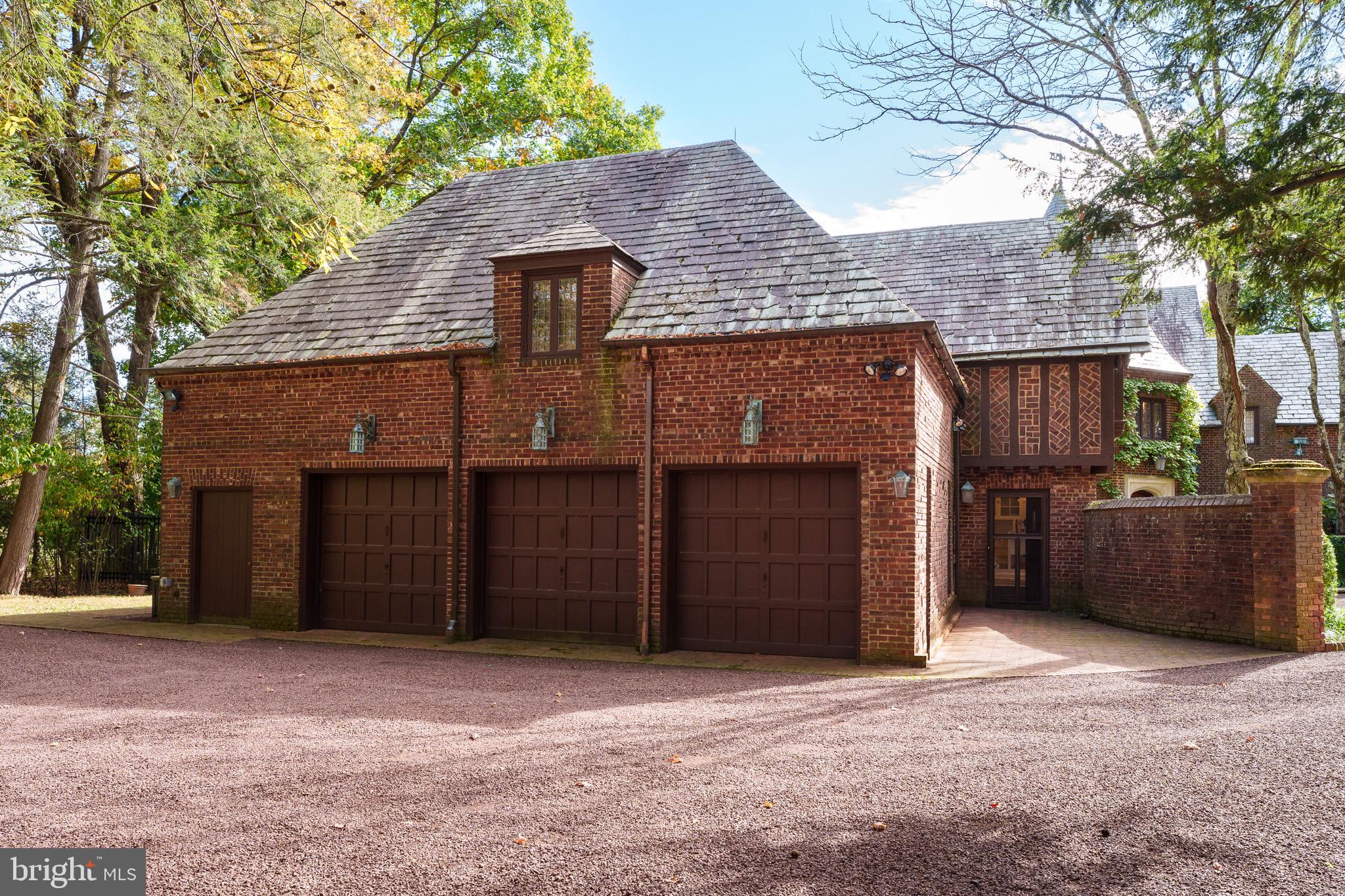 94 N Road Princeton, NJ 08540 - Photo 54 of 57 a front view of a house with a yard and garage