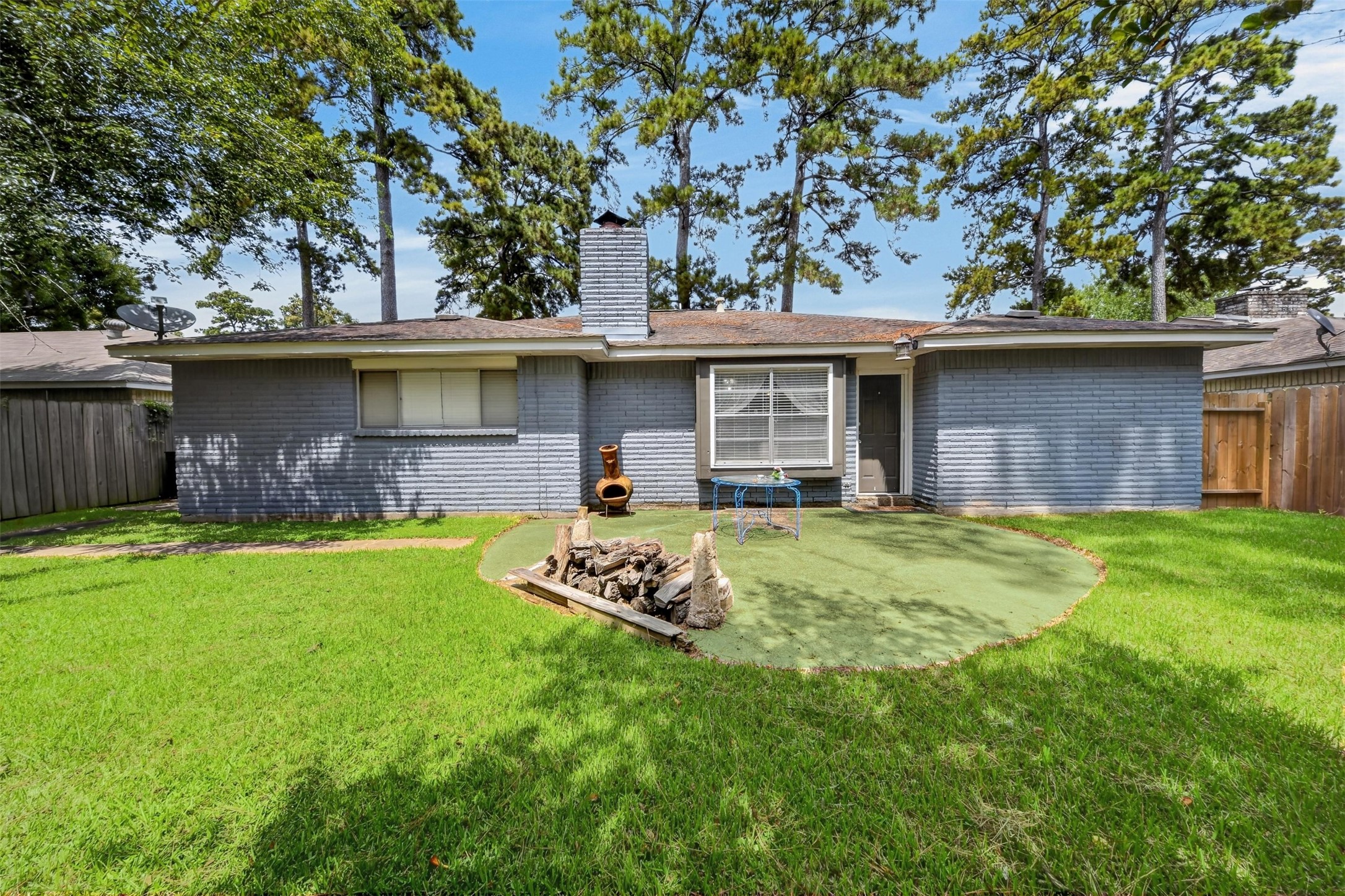 23127 Harpergate Drive Spring, TX 77373 - Photo 22 of 26 Fully fenced backyard offers privacy and plenty of room to enjoy.