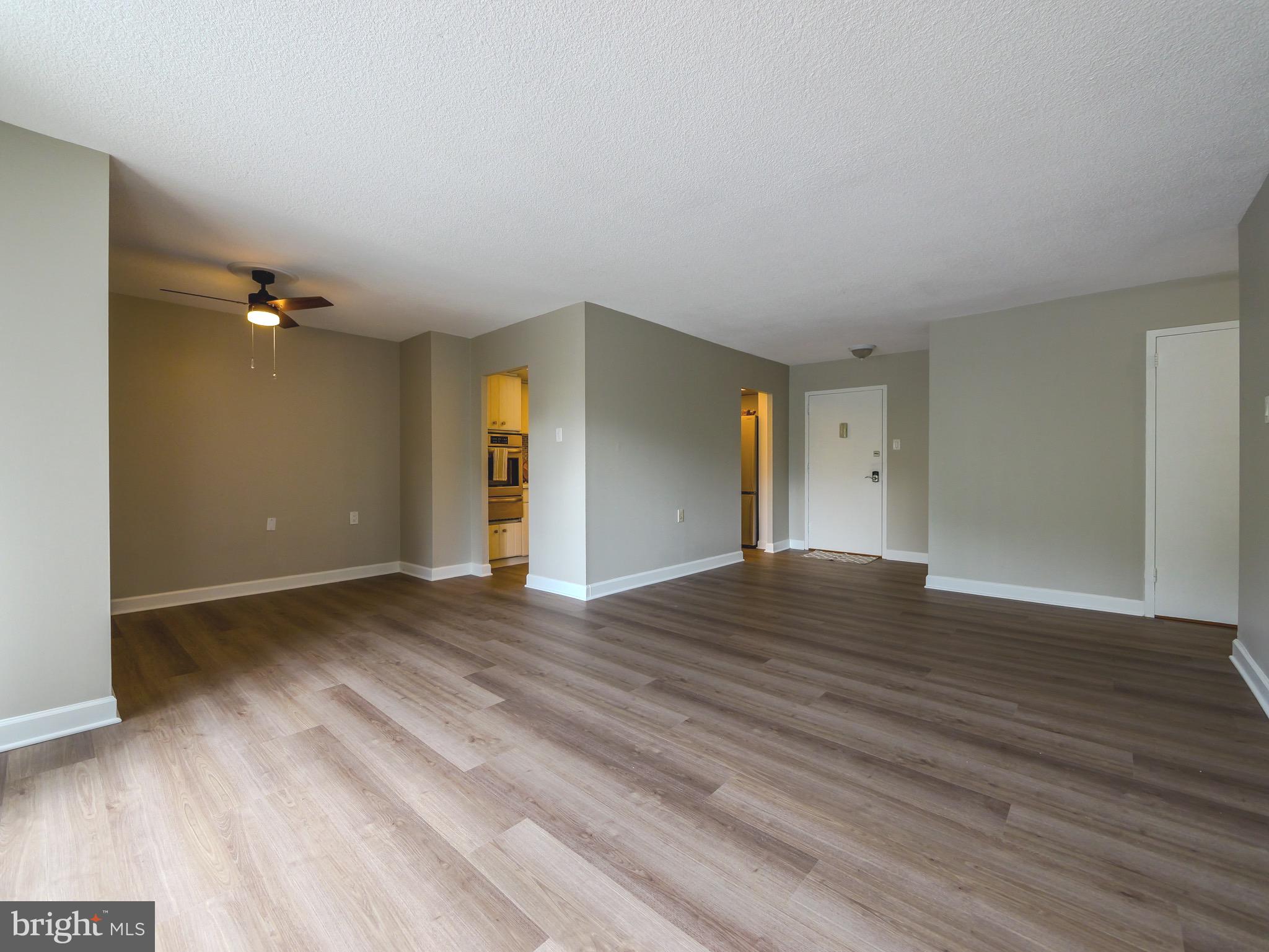 801 Yale Avenue, Unit 107 Swarthmore, PA 19081 - Photo 18 of 35 a view of an empty room and wooden floor