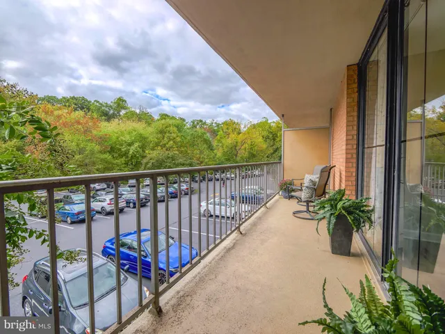 a view of balcony with furniture