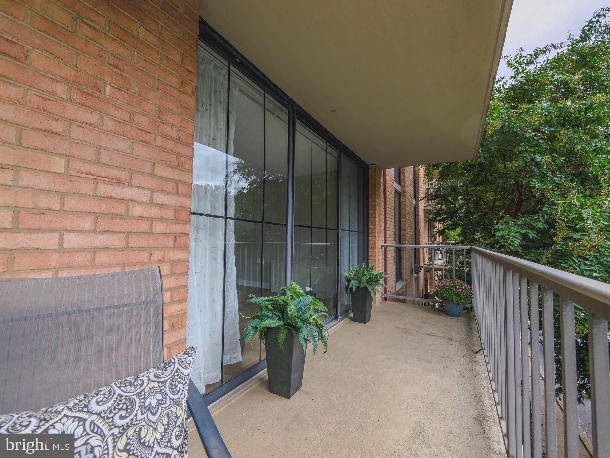 801 Yale Avenue, Unit 107 Swarthmore, PA 19081 - Photo 8 of 35 a view of balcony with potted plants