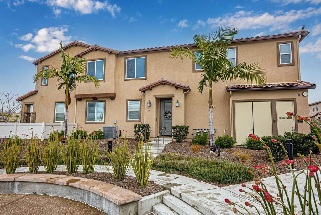 1254 Santa Victoria Road, Unit 1 Chula Vista, CA 91913 - Photo 1 of 1 a front view of a house with garden