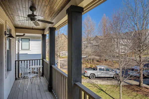 a view of a balcony with furniture