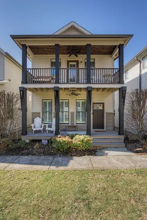 a front view of a house with swimming pool