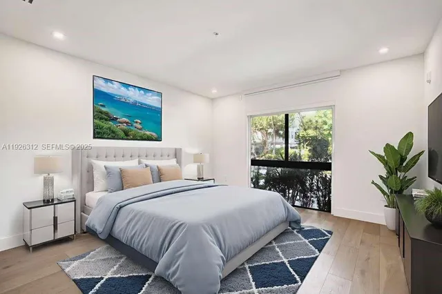 a view of a hallway with a bedroom