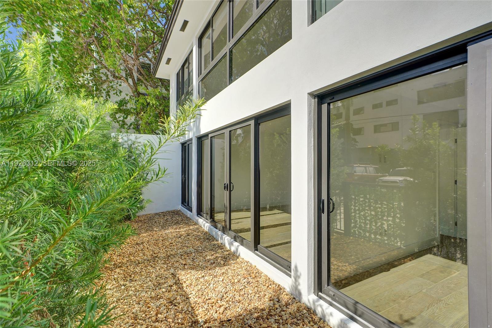 200 Sunrise Drive, Unit 200A Key Biscayne, FL 33149 - Photo 36 of 45 a view of a glass door