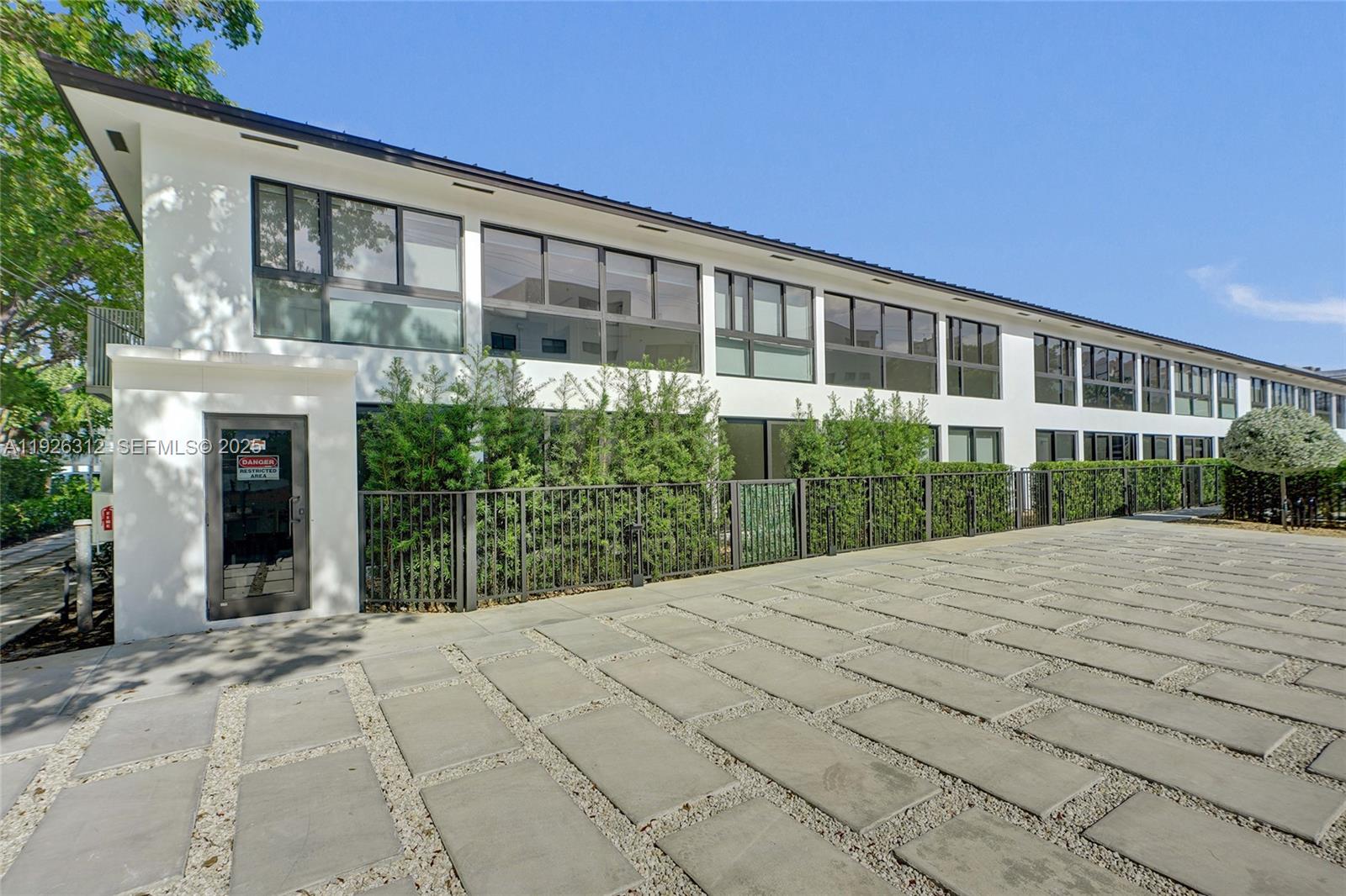 200 Sunrise Drive, Unit 200A Key Biscayne, FL 33149 - Photo 37 of 45 a balcony view with a garden space