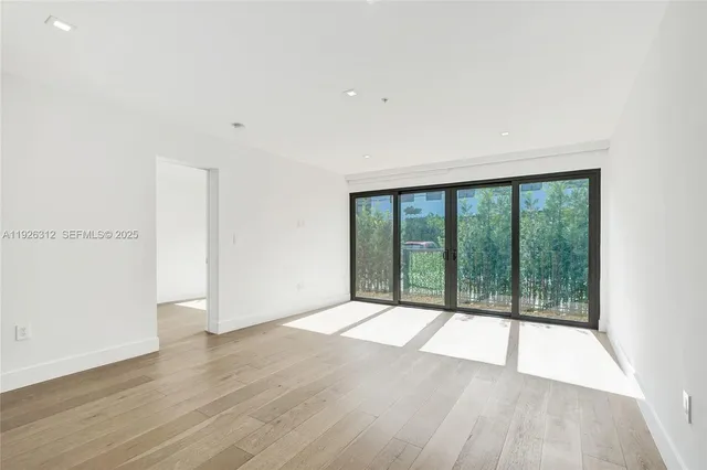 a bathroom with a double vanity sink and mirror