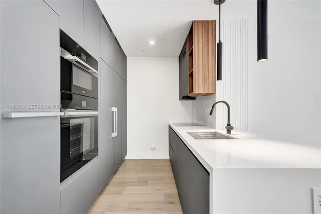 a view of swimming pool with outdoor seating and plants