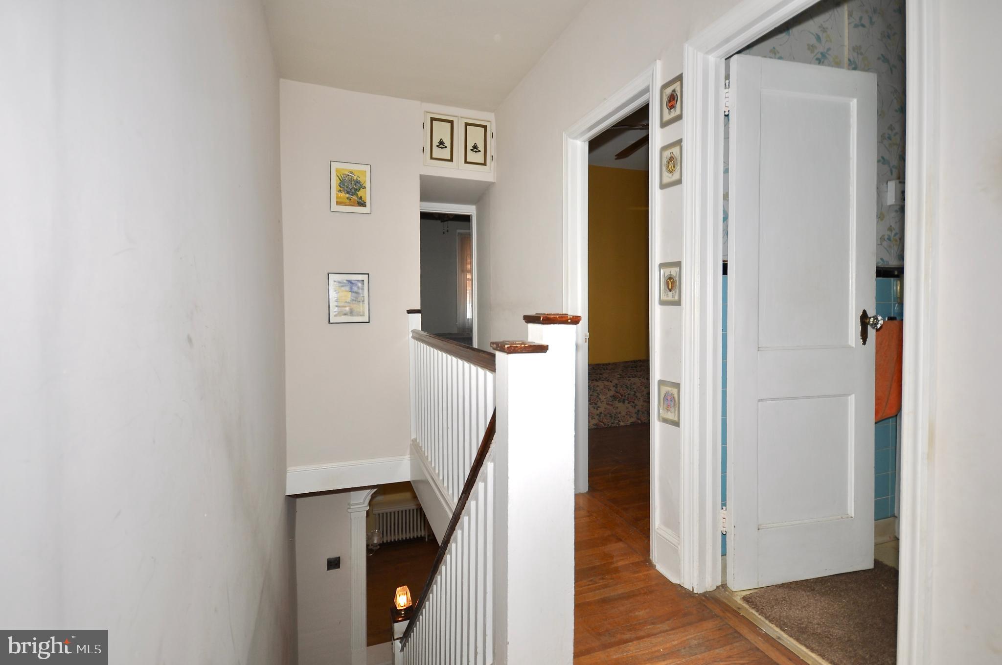 4566 Bermuda Street Philadelphia, PA 19124 - Photo 12 of 30 a view of a hallway with wooden floor and entryway