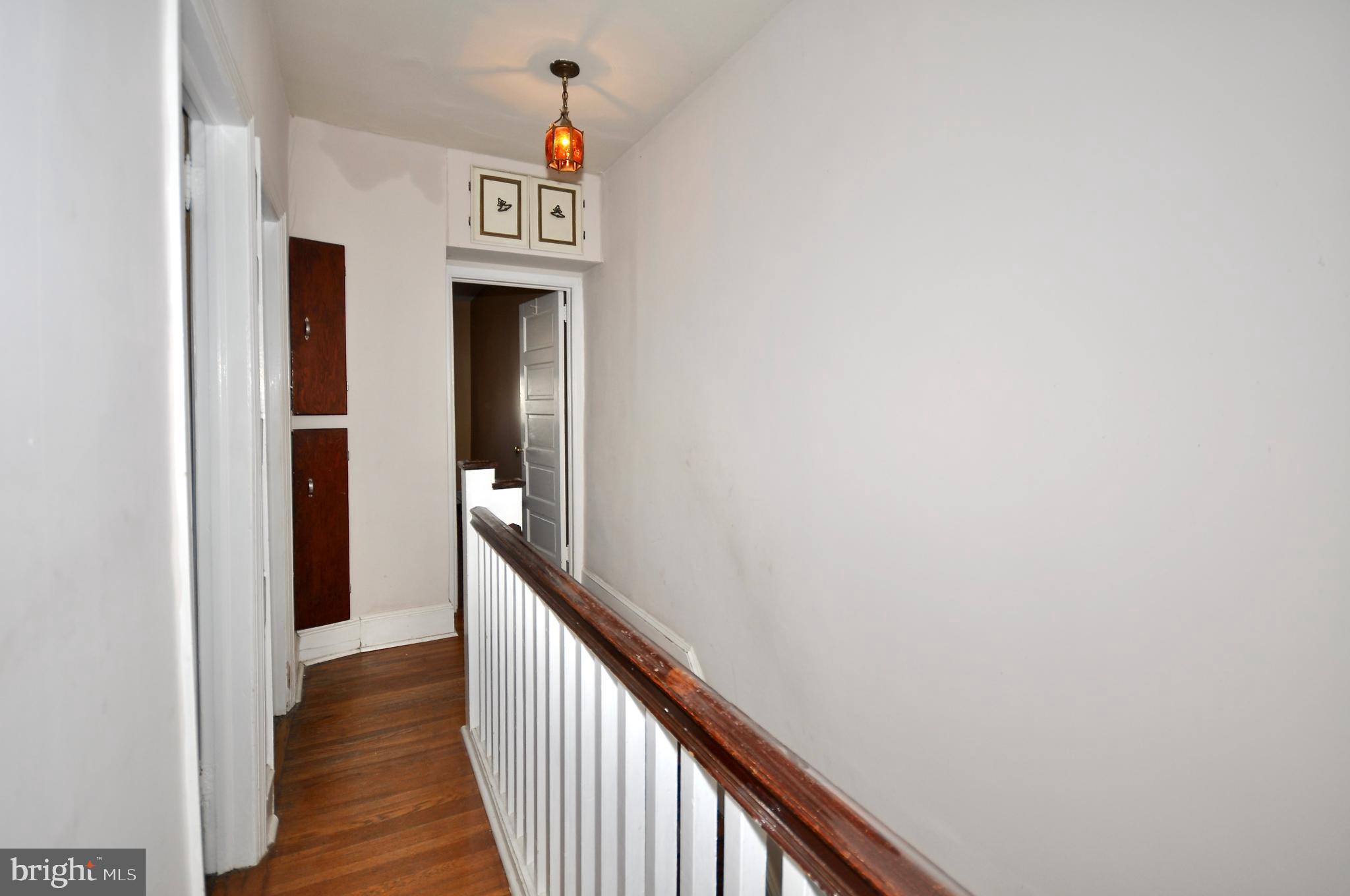 4566 Bermuda Street Philadelphia, PA 19124 - Photo 13 of 30 a view of a hallway with wooden floor