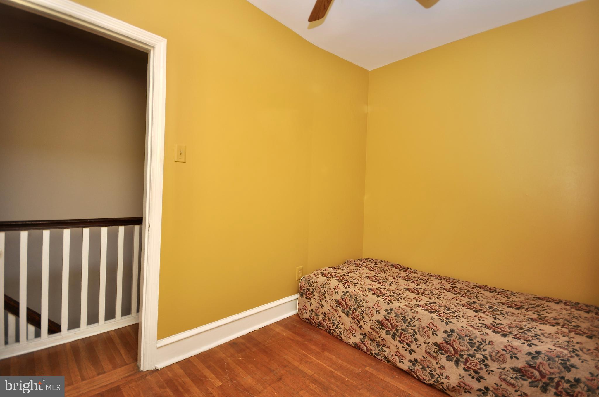 4566 Bermuda Street Philadelphia, PA 19124 - Photo 22 of 30 a view of bed and wooden floor