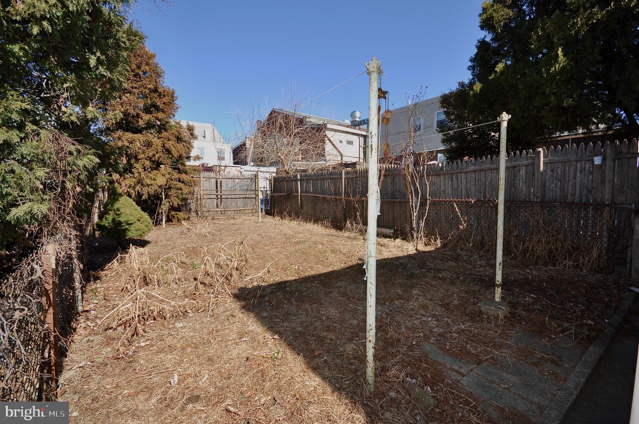 4566 Bermuda Street Philadelphia, PA 19124 - Photo 29 of 30 a view of a pathway with a wrought fence