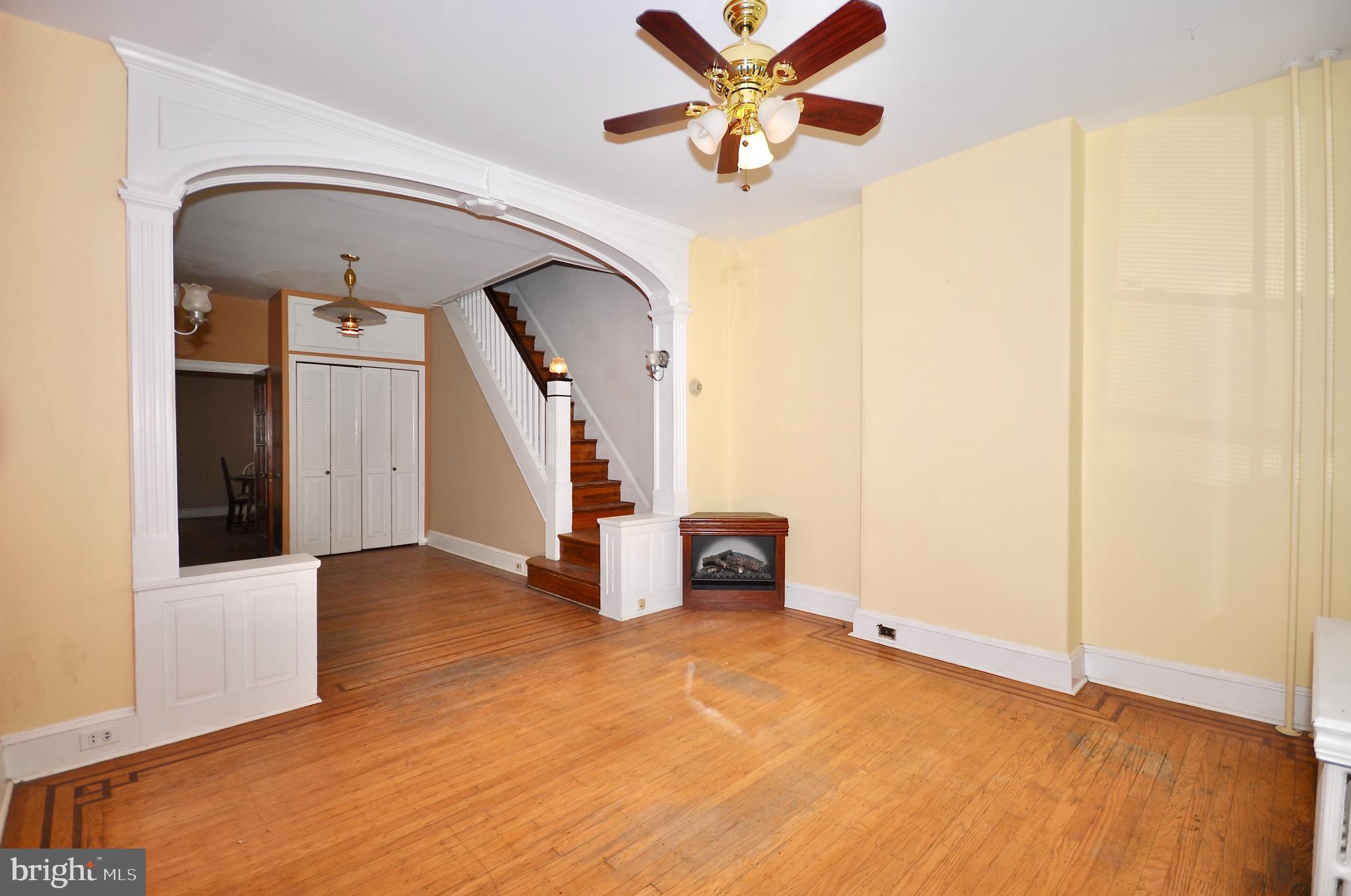 4566 Bermuda Street Philadelphia, PA 19124 - Photo 6 of 30 a view of a livingroom with a staircase