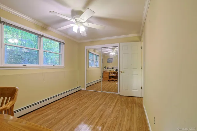 a view of a livingroom with a workspace