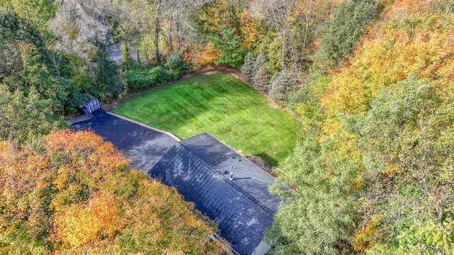 a view of a pathway with a yard