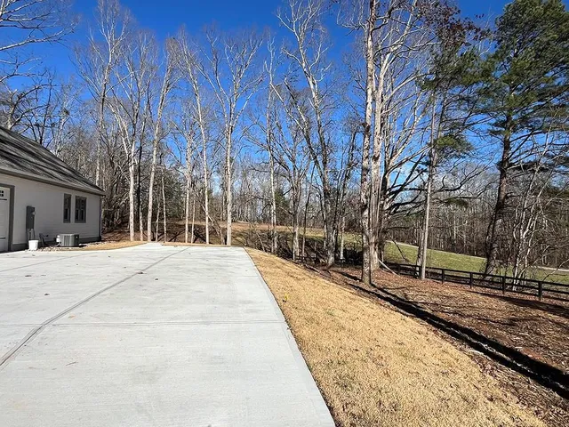 a house with trees in front of it