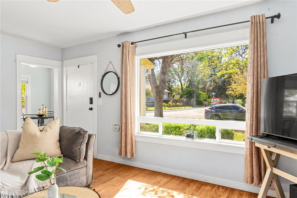 1151 Normal Avenue Chico, CA 95928 - Photo 11 of 32 a living room with furniture and a large window
