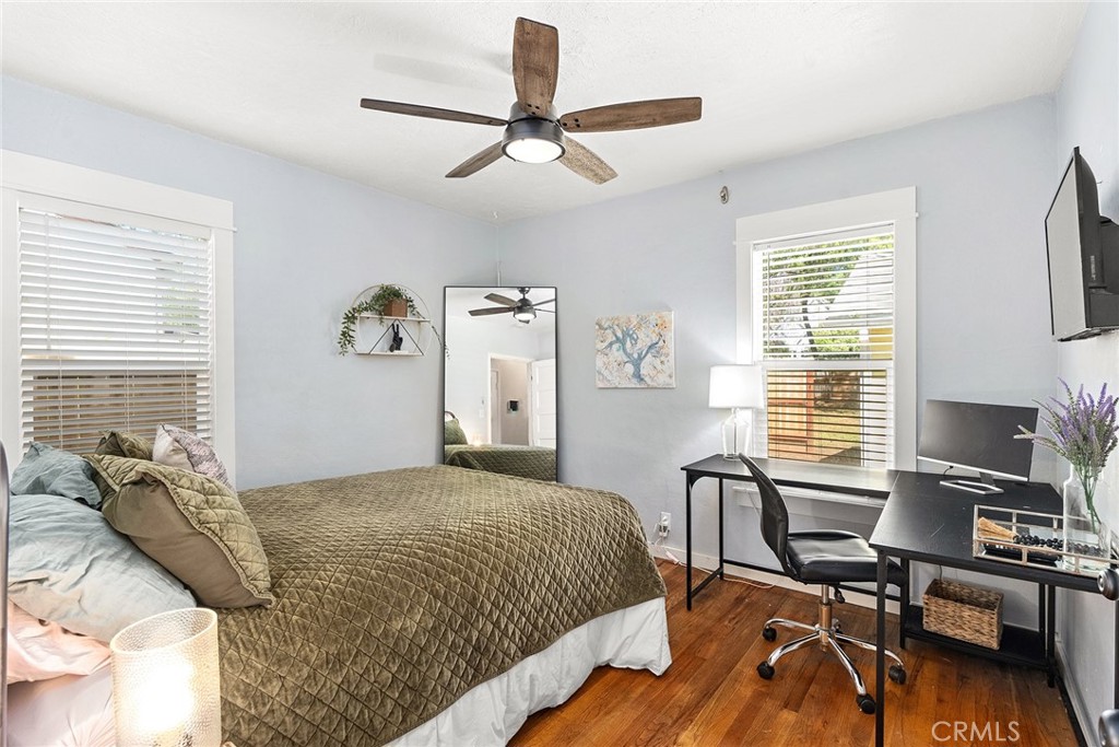 1151 Normal Avenue Chico, CA 95928 - Photo 18 of 32 a bedroom with a bed and a desk