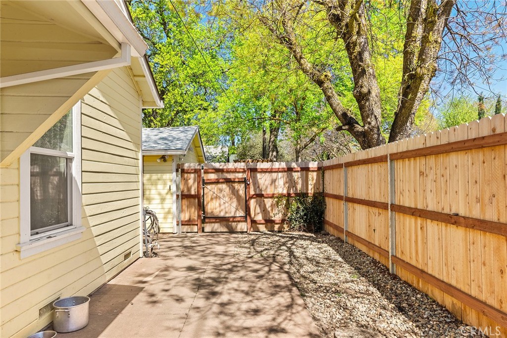 1151 Normal Avenue Chico, CA 95928 - Photo 23 of 32 a view of a balcony with wooden fence and floor