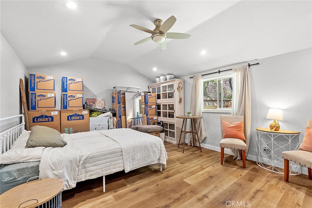 1151 Normal Avenue Chico, CA 95928 - Photo 25 of 32 a bedroom with a bed furniture and window