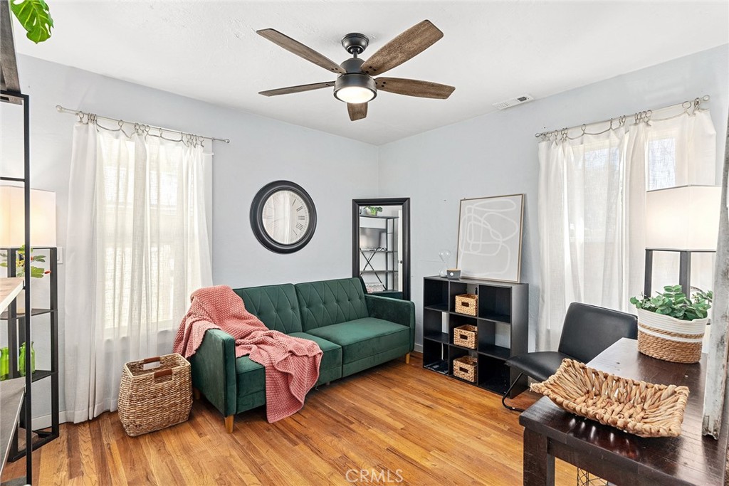 1151 Normal Avenue Chico, CA 95928 - Photo 4 of 32 a living room with furniture a rug and a window