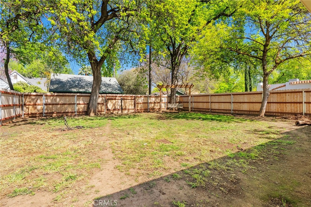 1151 Normal Avenue Chico, CA 95928 - Photo 6 of 32 a view of a yard with wooden fence
