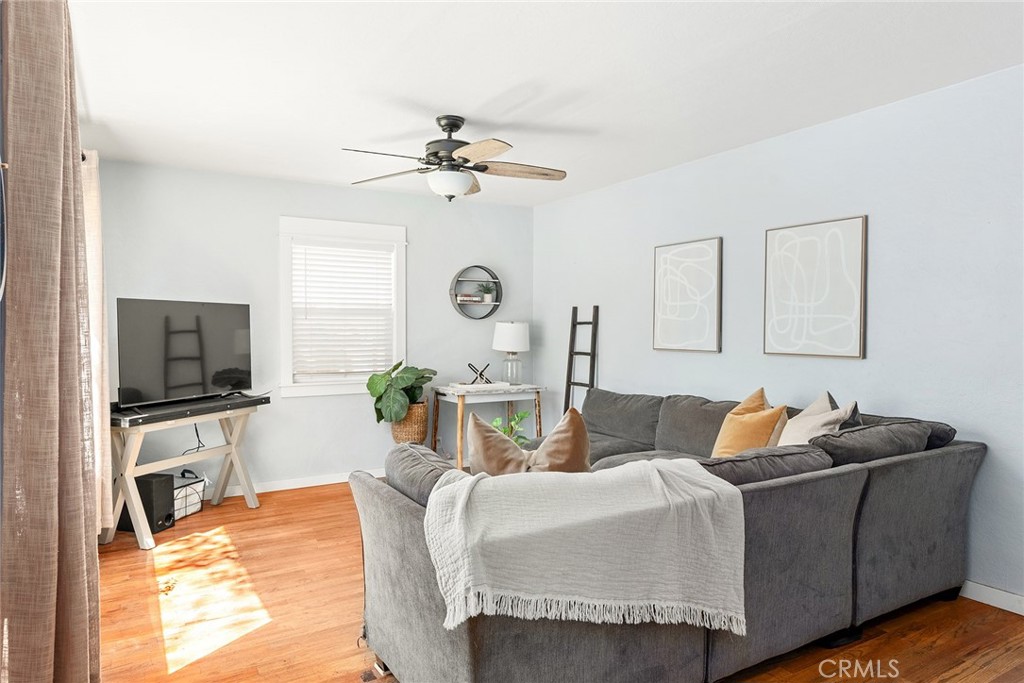 1151 Normal Avenue Chico, CA 95928 - Photo 8 of 32 a living room with furniture and a flat screen tv