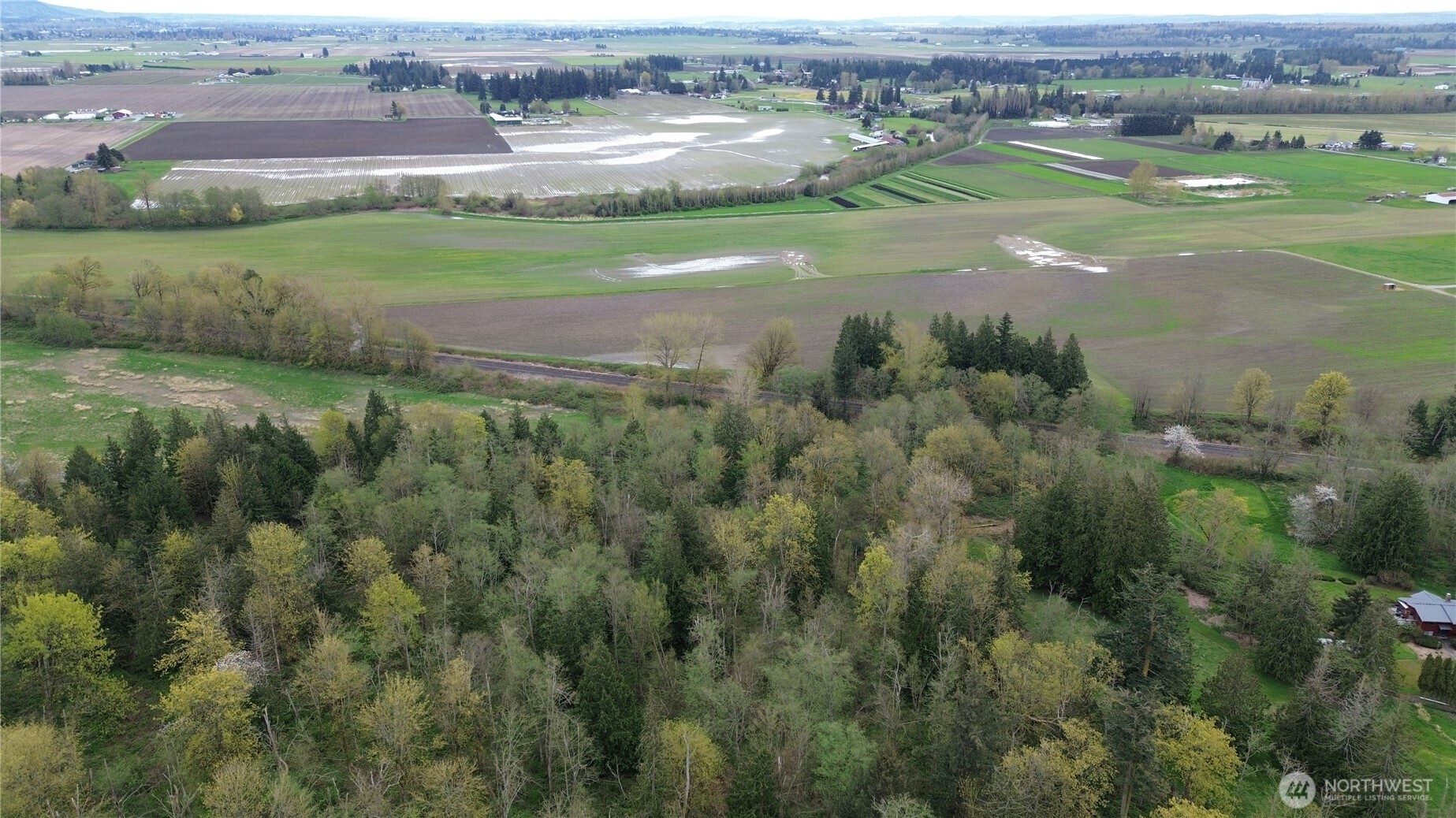 17584 Allen Road Bow, WA 98232 - Photo 1 of 20 an aerial view of a houses with outdoor space and mountain view