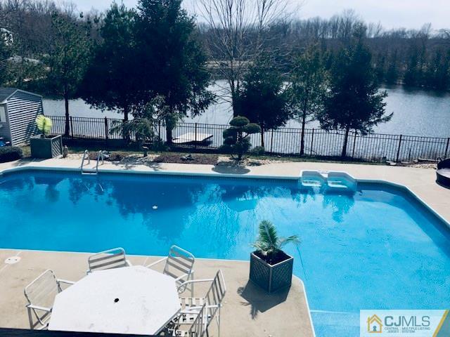 14 Mapleton Road Old Bridge, NJ 08857 - Photo 22 of 23 a view of a swimming pool with a patio
