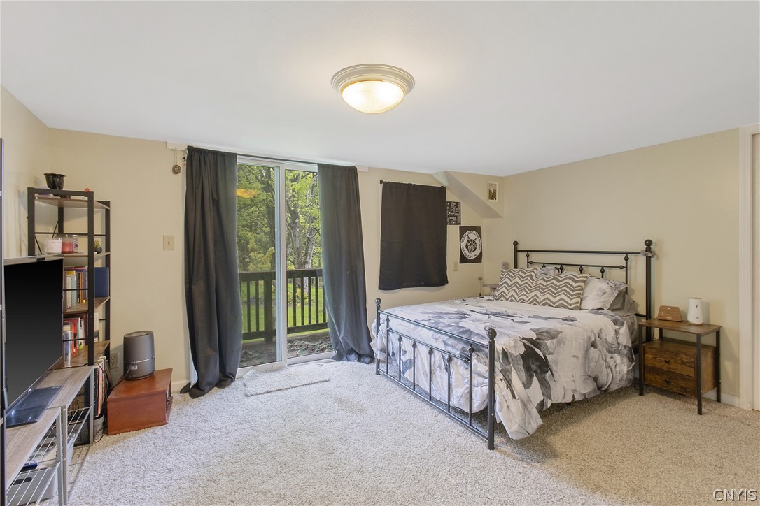 8355 Tuttle Road Cicero, NY 13030 - Photo 26 of 46 This large bedroom is upstairs ...