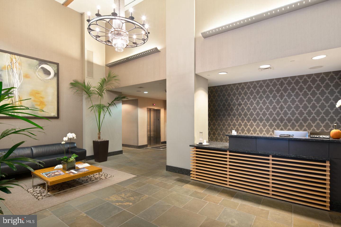 1425 Locust Street, Unit 5C Philadelphia, PA 19102 - Photo 25 of 27 Aria Lobby and Concierge Desk