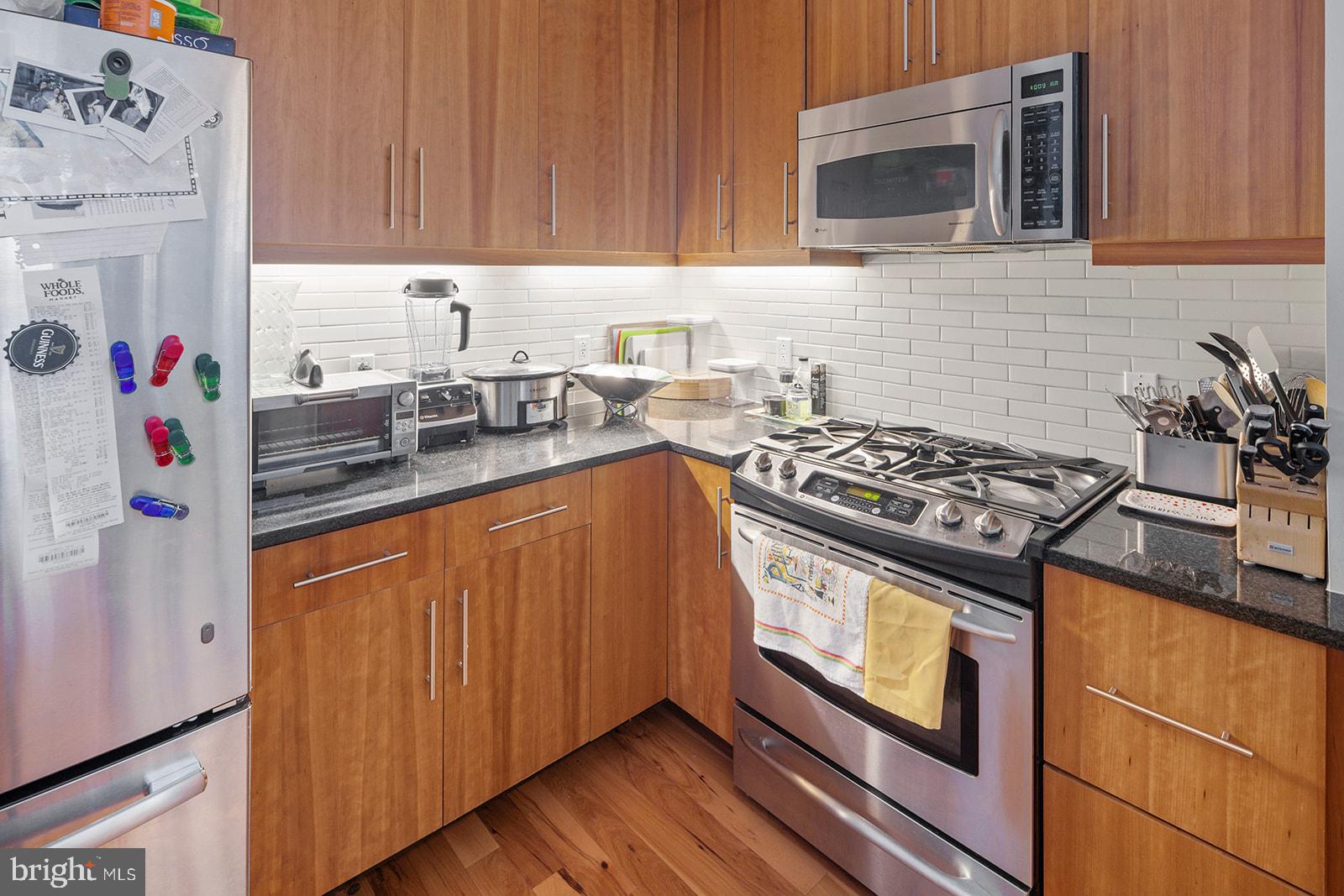 1425 Locust Street, Unit 5C Philadelphia, PA 19102 - Photo 4 of 27 Built in Microwave and gas range