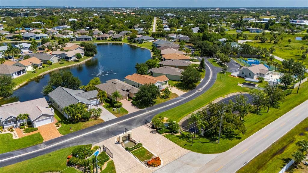 24604 Rio Villa Lakes Circle Punta Gorda, FL 33950 - Photo 28 of 28 an aerial view of residential houses with outdoor space